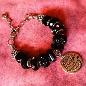 Silver snake chain charm bracelet with black glass beads and 1 silver charm